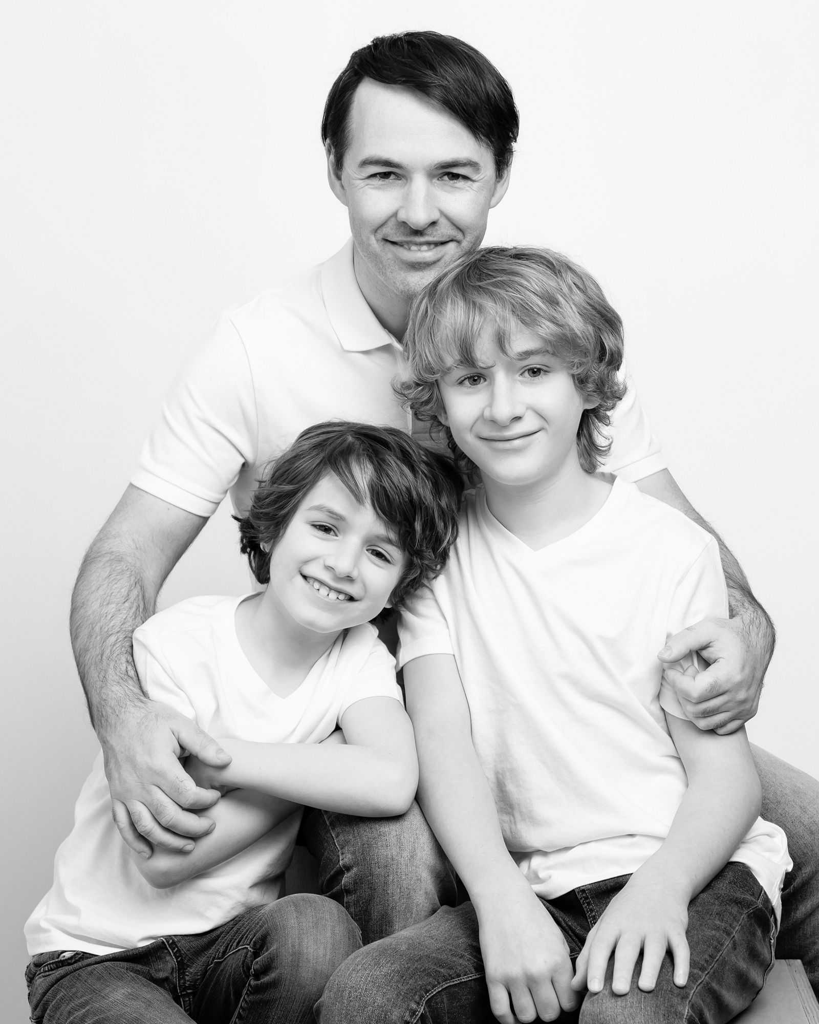 Father and sons portrait in black and white Vancouver BC.