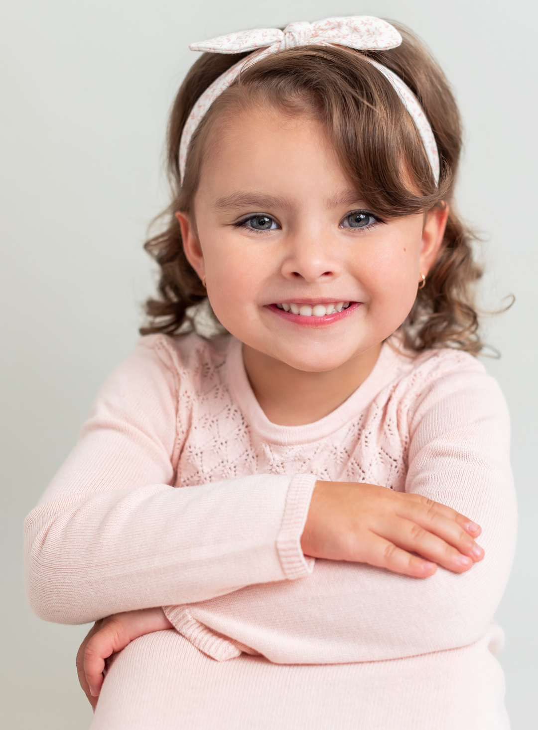 Vintage child portrait of mila jones with curly hair